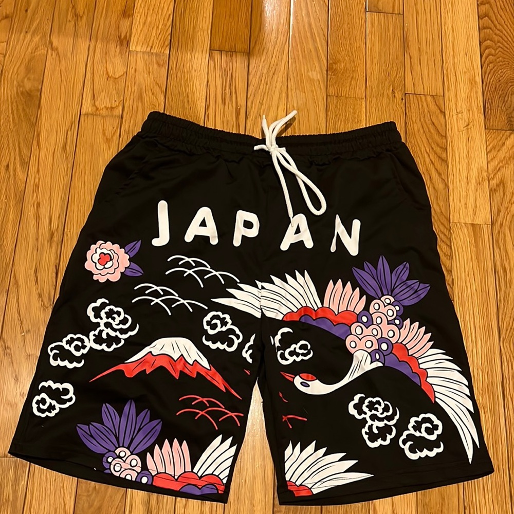 Black athletic shorts with Japan design